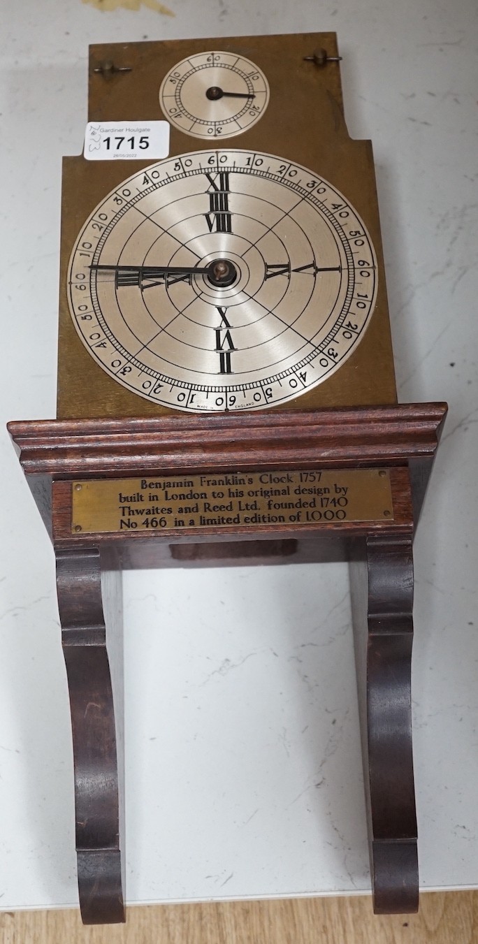 A limited edition Benjamin Franklins clock ‘built in London to his original design by Thwaites and Reed ltd.’ 466-1000